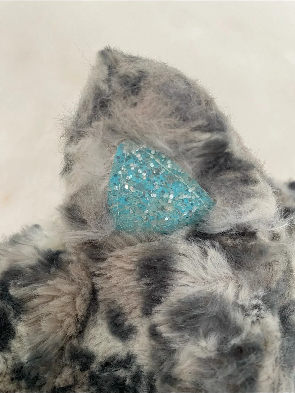 Justice Faux Fur Animal Ear Hat with Aqua Lining and Glitter 'K'